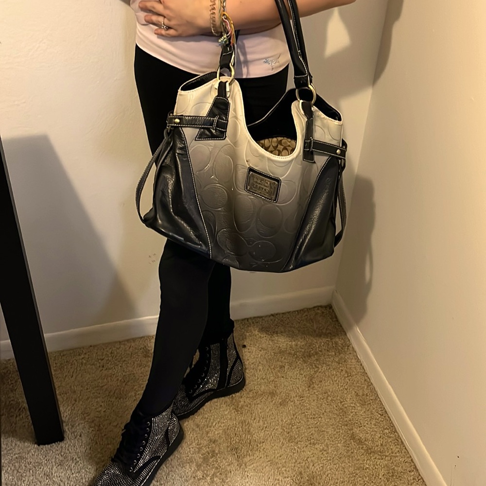 Mint condition coach purse black and whit and grey